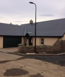 An image of a house we plastered with a beige colour