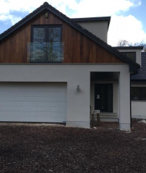 An image of a nice modern style house we plastered