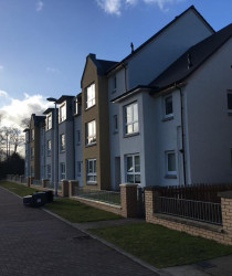 An image of a set of houses we plastered