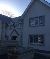 An image of a pair of semi detached houses we plastered