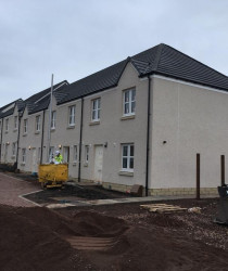 An image of a set of houses we plastered