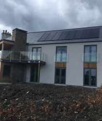 An image of a modern style house we plastered