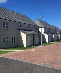 An image of the back of a set of houses we plastered