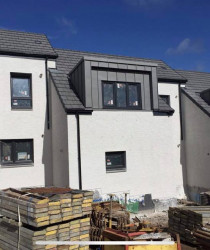 An image of a set of modern style houses we plastered