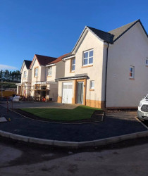 An image of a set of houses we plastered