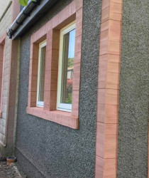 an image of a rough cast wall